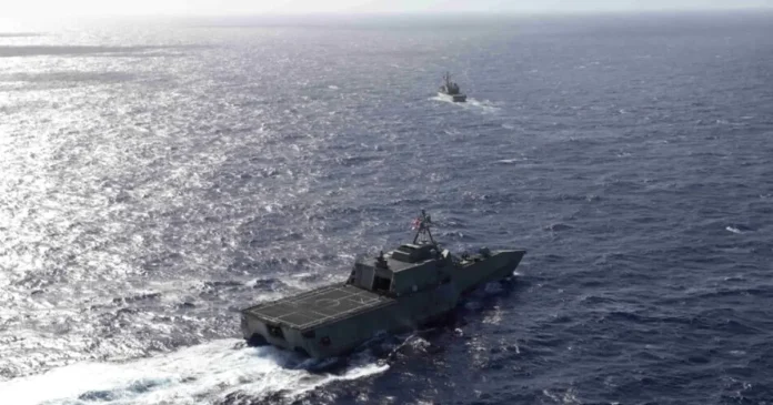 China deplasează nave militare în zona disputată și acuză SUA de amenințare regională